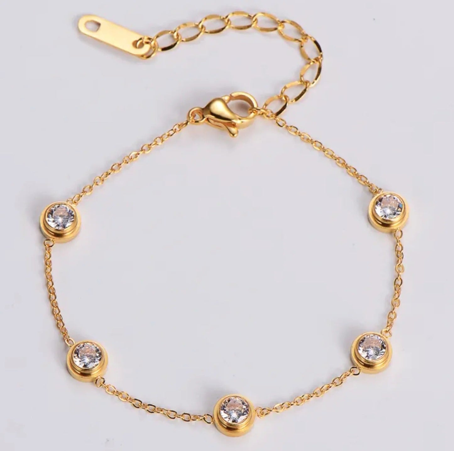 Elegant bracelet with zirconias in gold