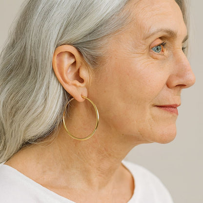 Large hoop earrings in gold